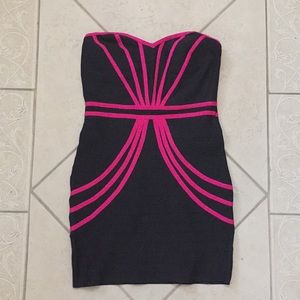 Strapless black bandage dress with hot pink piping